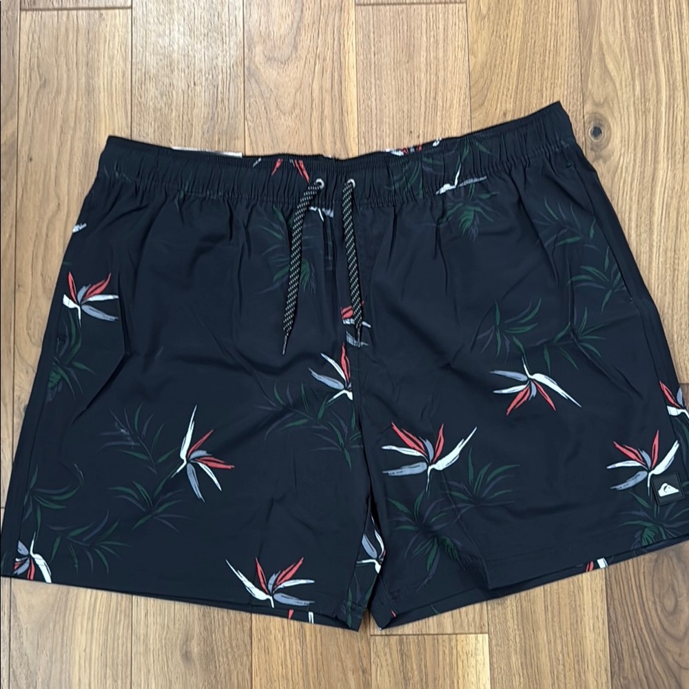 Quiksilver Black and Red Swim Trunks with Tropical Print